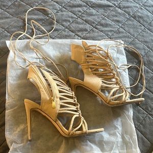 Women’s lace up heels. Worn once so bottoms are dirty but heels are clean
